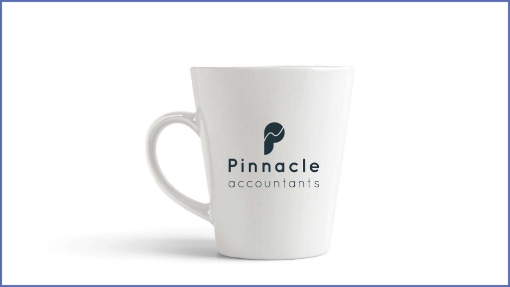Pinnacle Accountants logo on a coffee cup, reflecting a modern and professional identity for an accountancy business.